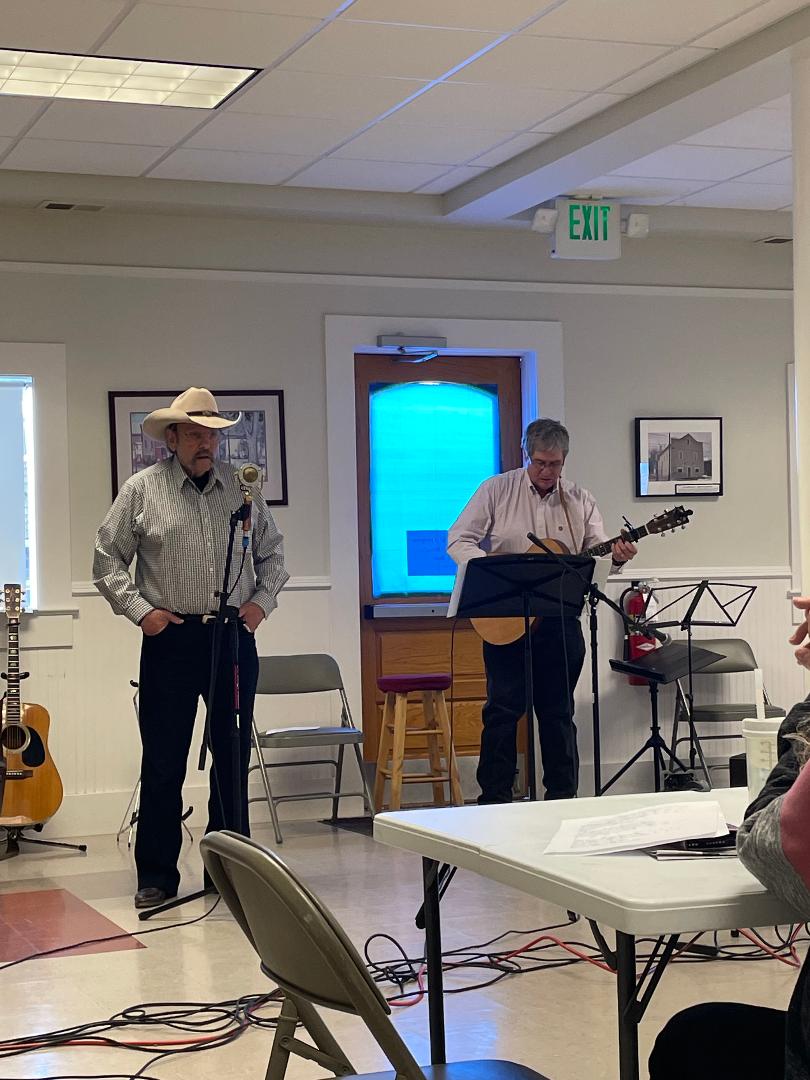 open stage cowboy poet